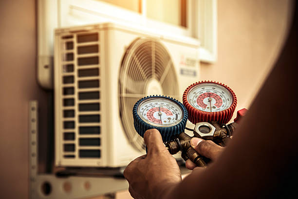 Professional Air Conditioning Service technician working in Montpelier, OH